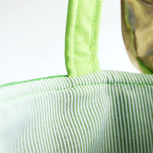 Eid al Adha Ram Basket is lined with a striped green fabric on the inside. Shop at Hello Holy Days!