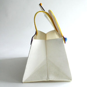 Ramadan Basket in the shape of a mosque. Folds from the sides for easy storage. Shop at Hello Holy Days!