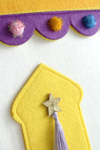 Load image into Gallery viewer, Detail of pompoms and tassel on Hello Holy Days&#39; Mosque Ramadan Basket.
