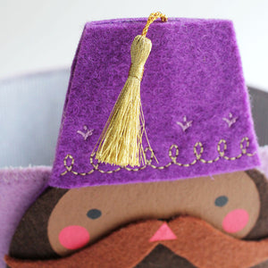 Ramadan Drummer basket, tassel detail. Basket is available to shop at Hello Holy Days.